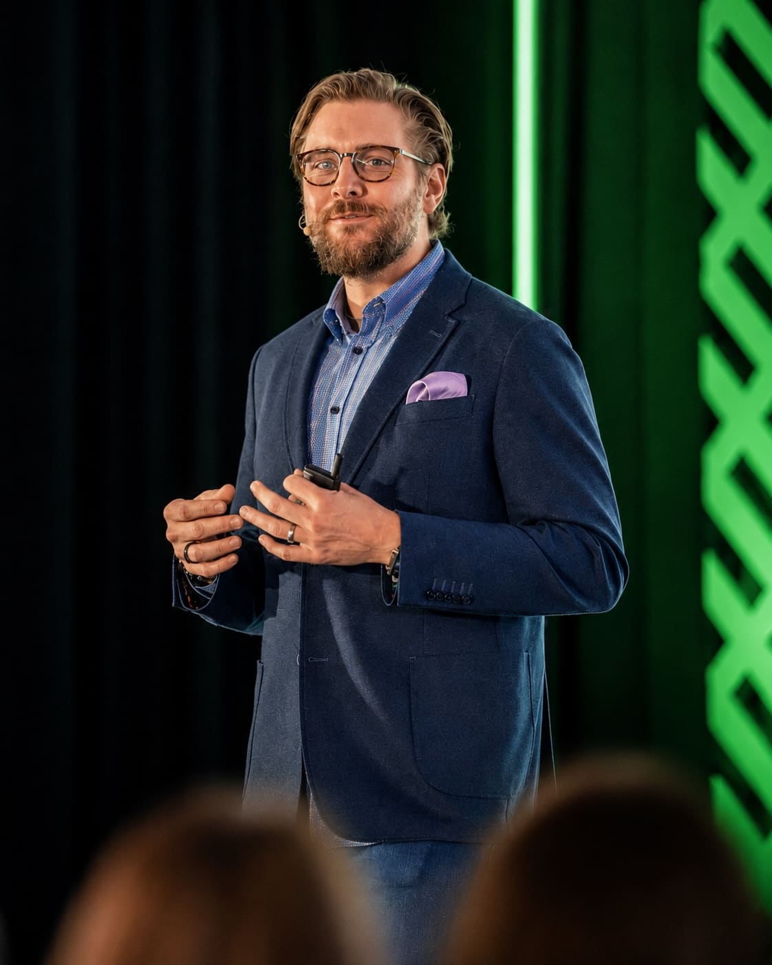 FirmVoice founder speaking on stage